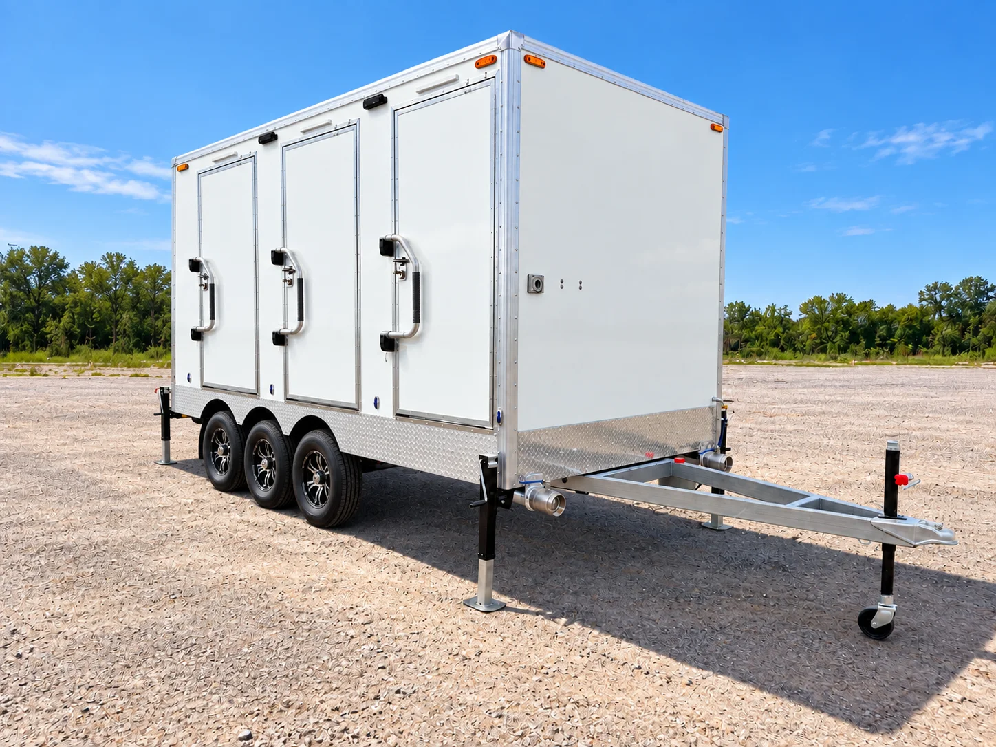 Combination shower-restroom trailer exterior and hitch